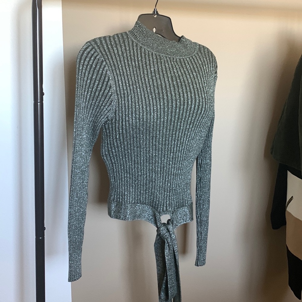 Beautiful silver/green knit top with an attached belt.